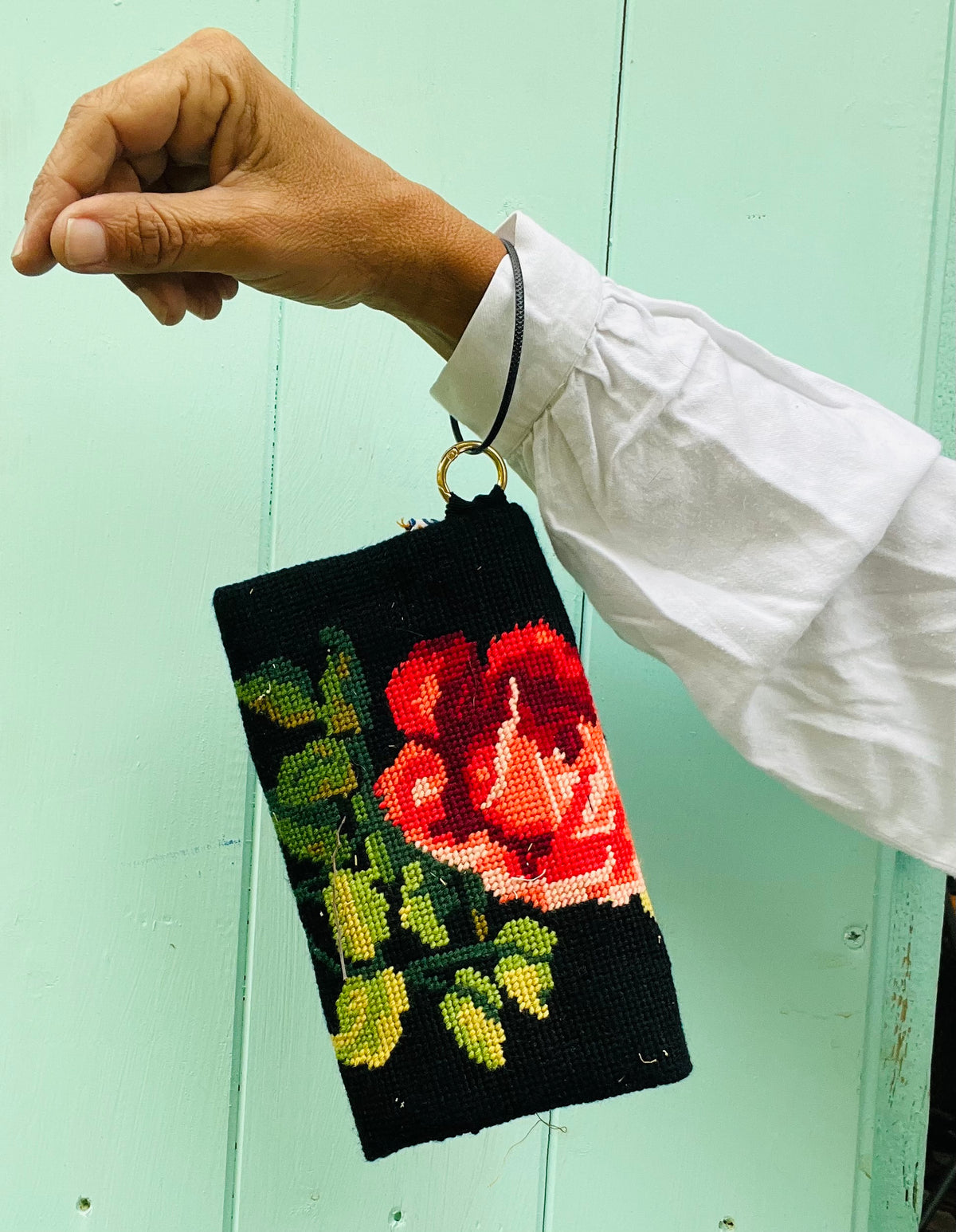 Pochette da polso mezzo punto fondo nero